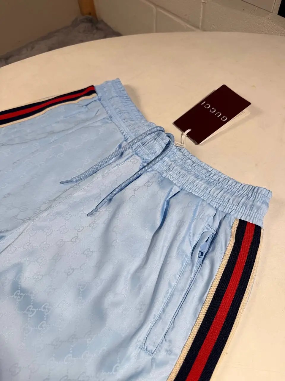 UCCI STRIPPED SHORTS by Stock supplier