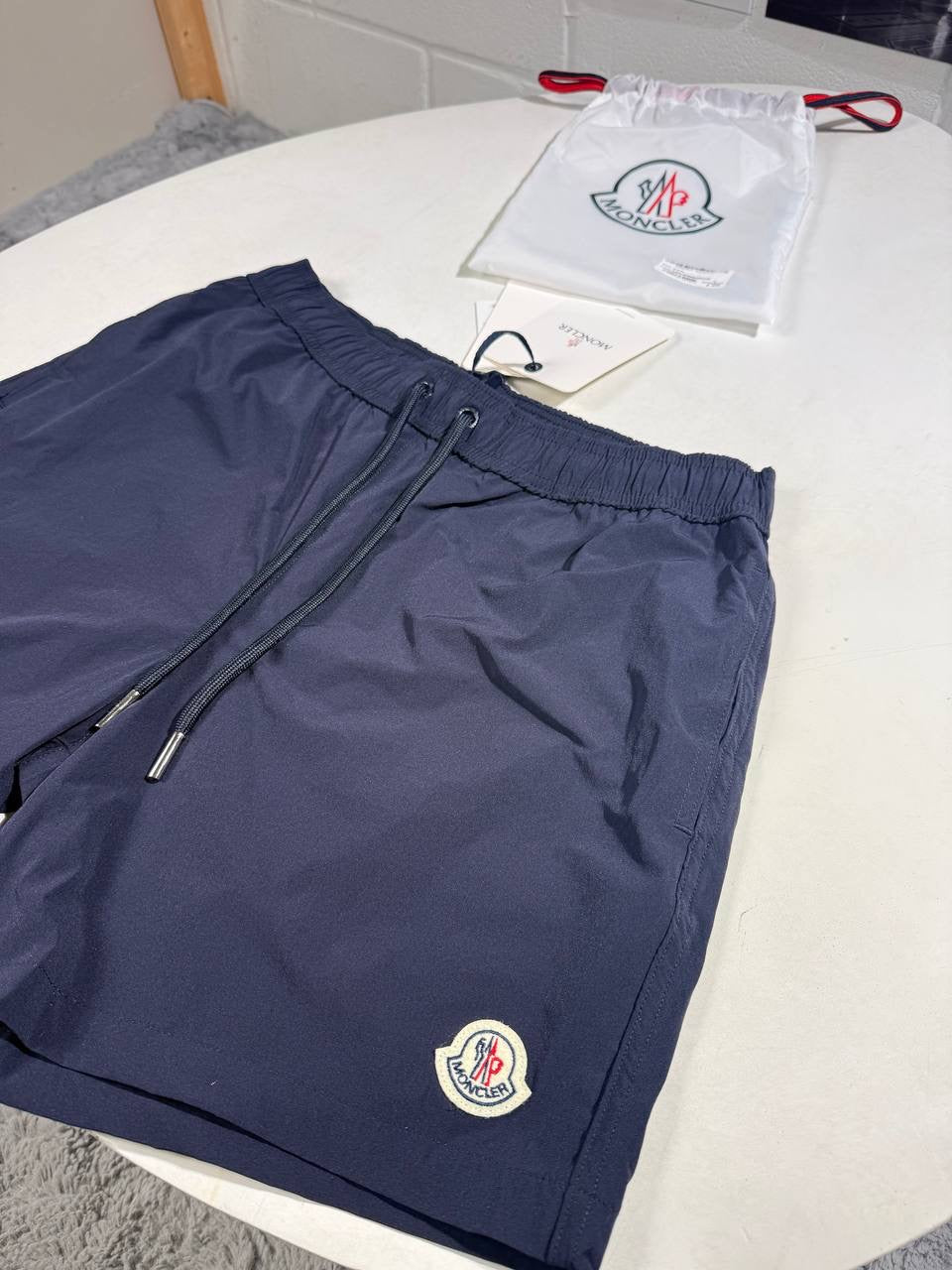 MNCLR LOGO SWIM SHORTS