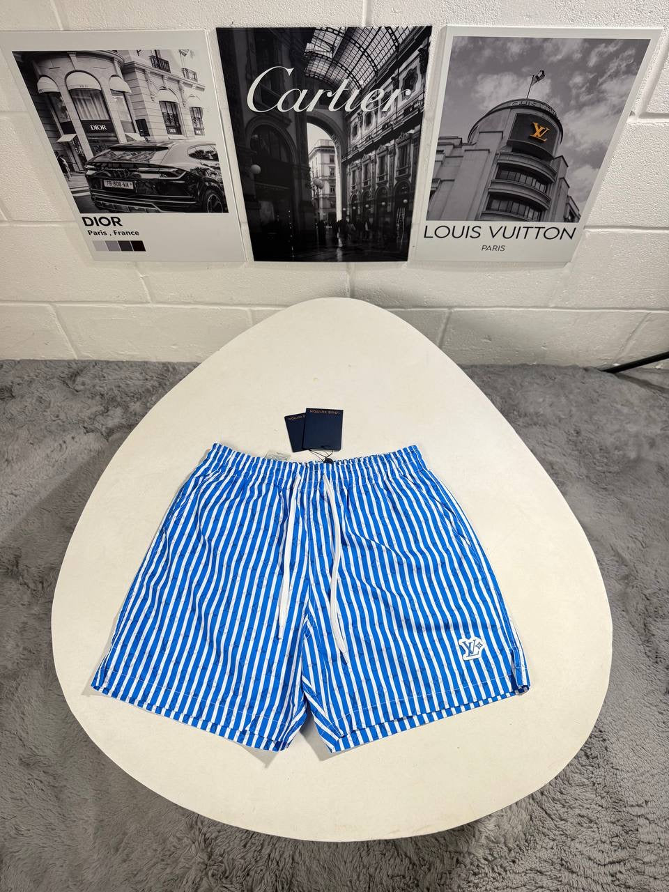 LVE MONOGRAM STRIPPED SWIM SHORTS