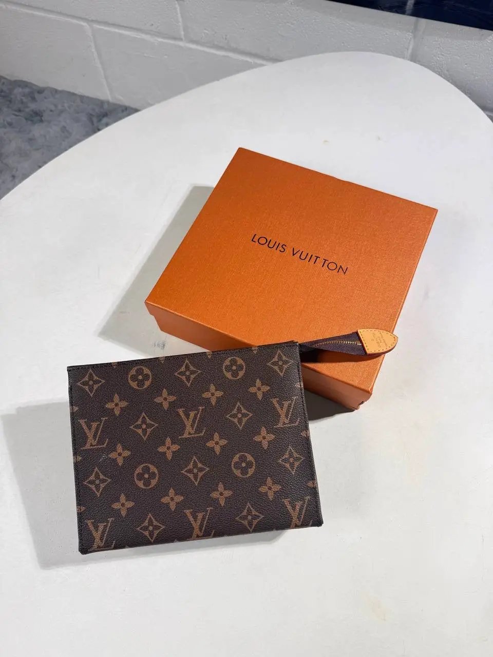 LVE MONOGRAM POUCH by Stock supplier